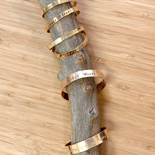 Ninotchka Stamped Message Cuffs Collection